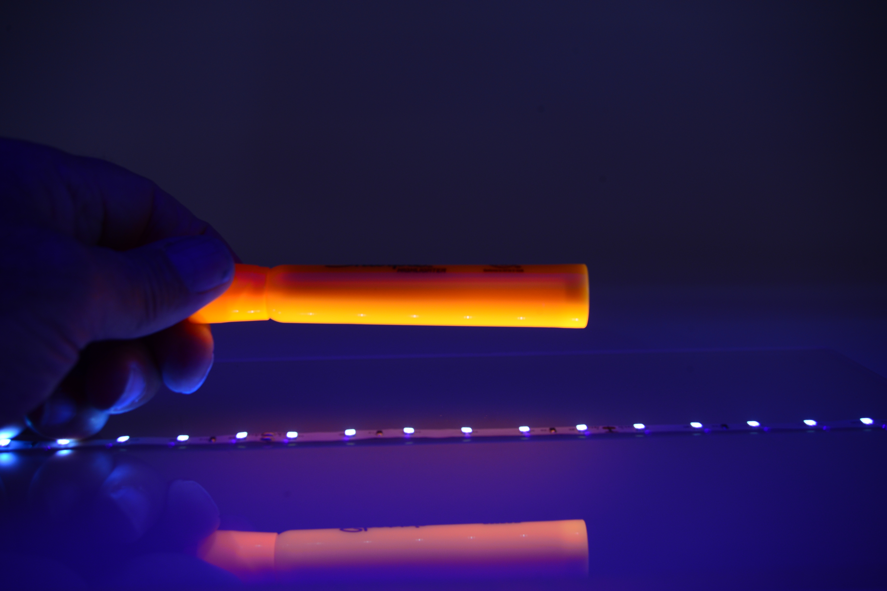 QolorFLEX UV LED Tape, shown with orange highlighter