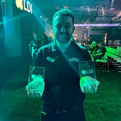 City Theatrical Electrical Engineer Adam Seidman with two LDI product awards