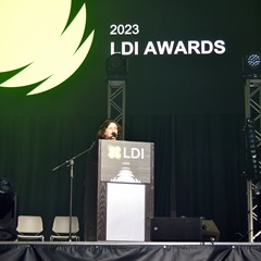 Ellen Lampert-Greaux at LDI Awards, presenting the LDI Best Debuting Product Award for Lighting Controls